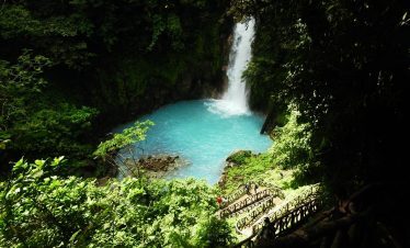 a waterfall in a forest