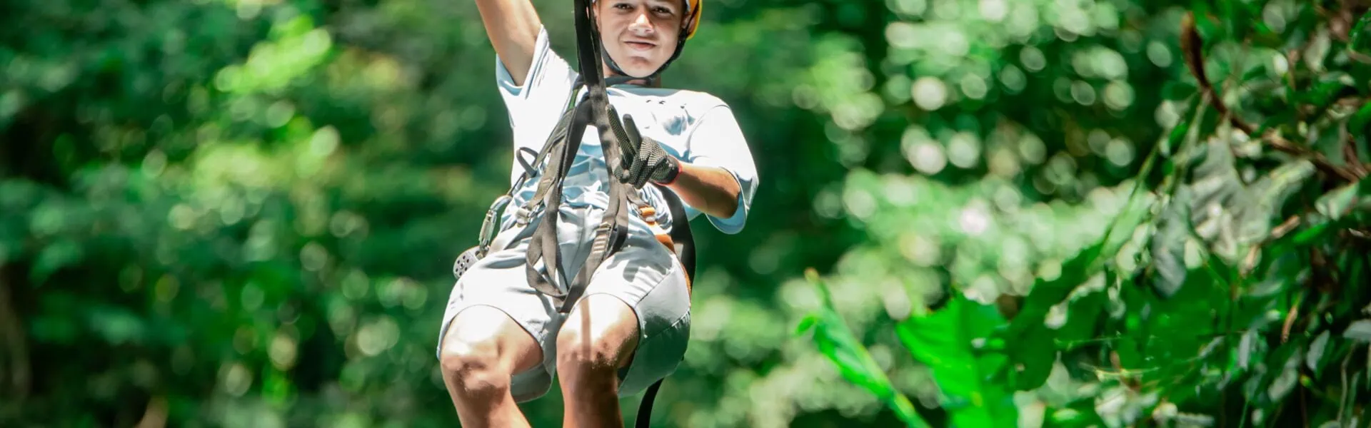 ziplining through the forest rio celeste.jpg
