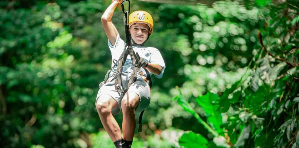 ziplining through the forest rio celeste.jpg