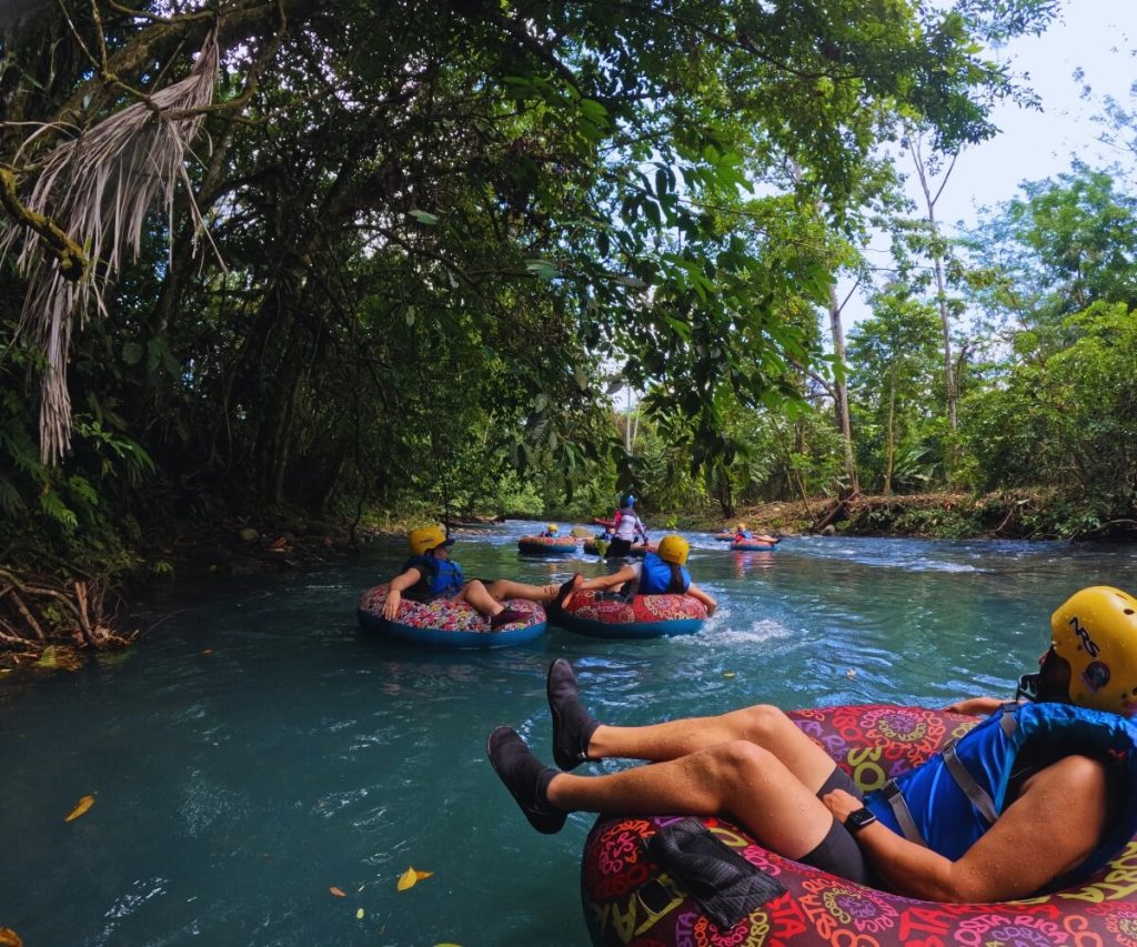 people on tubes in a river