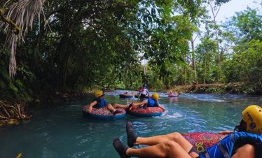 people on tubes in a river
