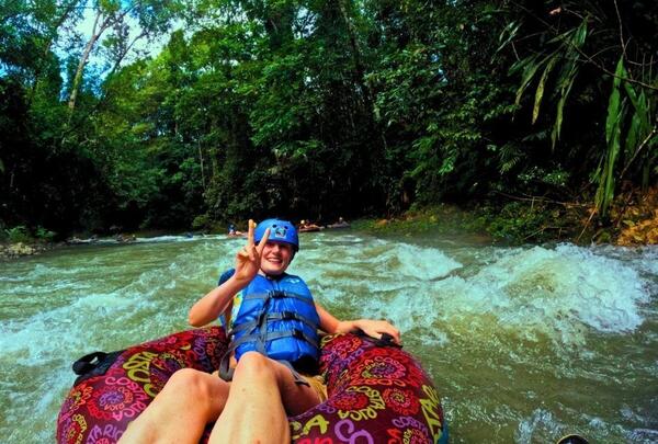 a person on a raft in a river