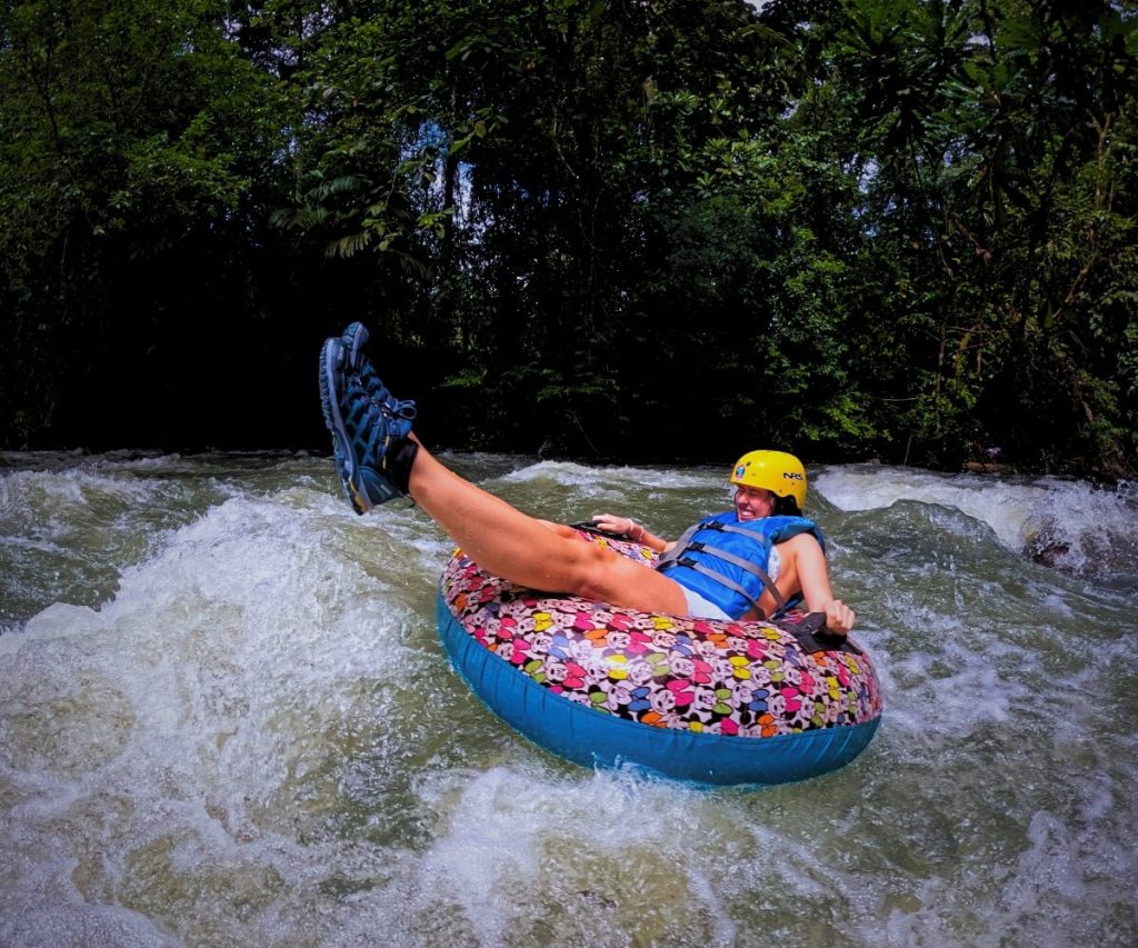 a person on a tube in the water
