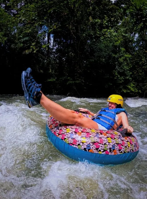 a person on a tube in the water