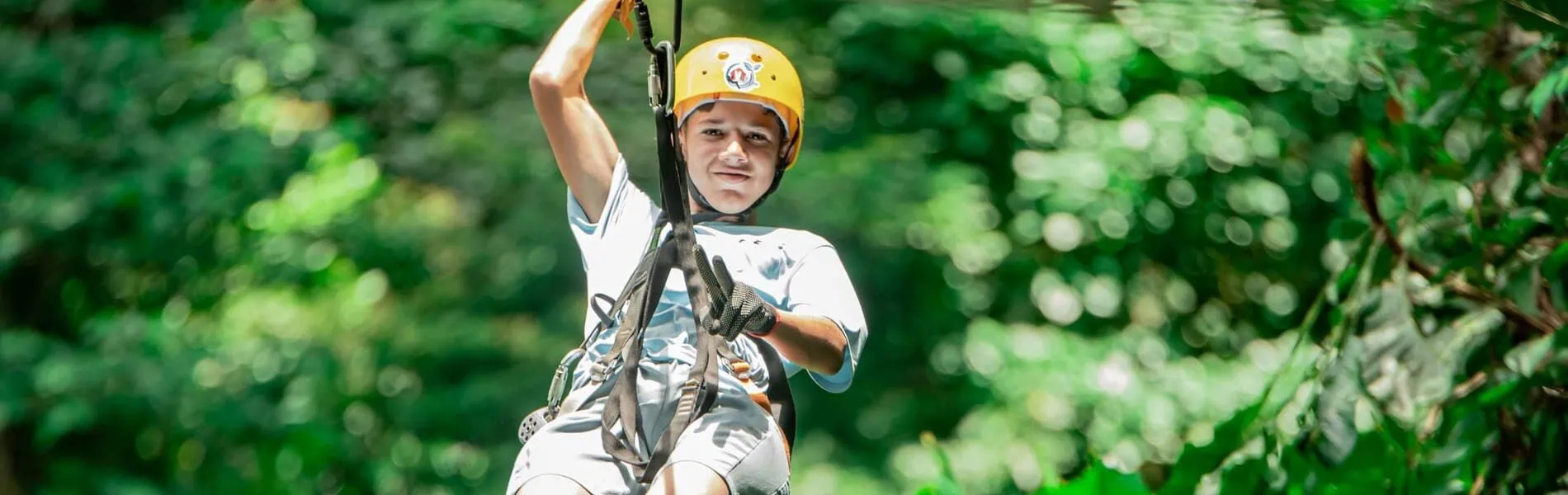 ziplining through the forest rio celeste.jpg